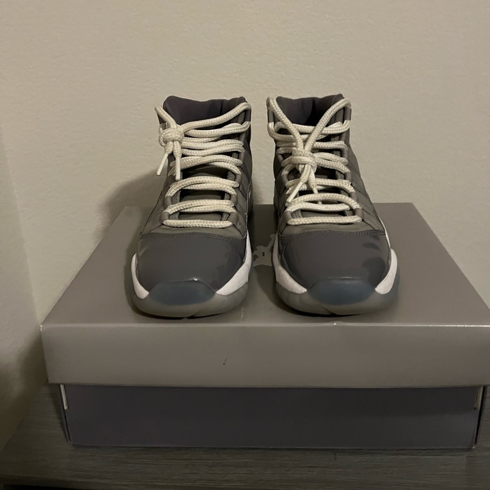 Cool Grey 11’s slightly used and creased. Has box and wrapping.